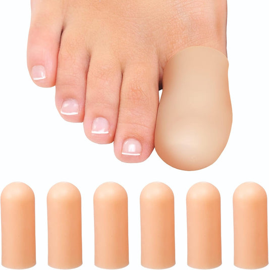 Soft silicone toe caps shown on foot to protect toes from friction inside everyday shoes